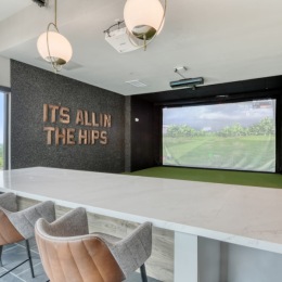 golf simulator with table