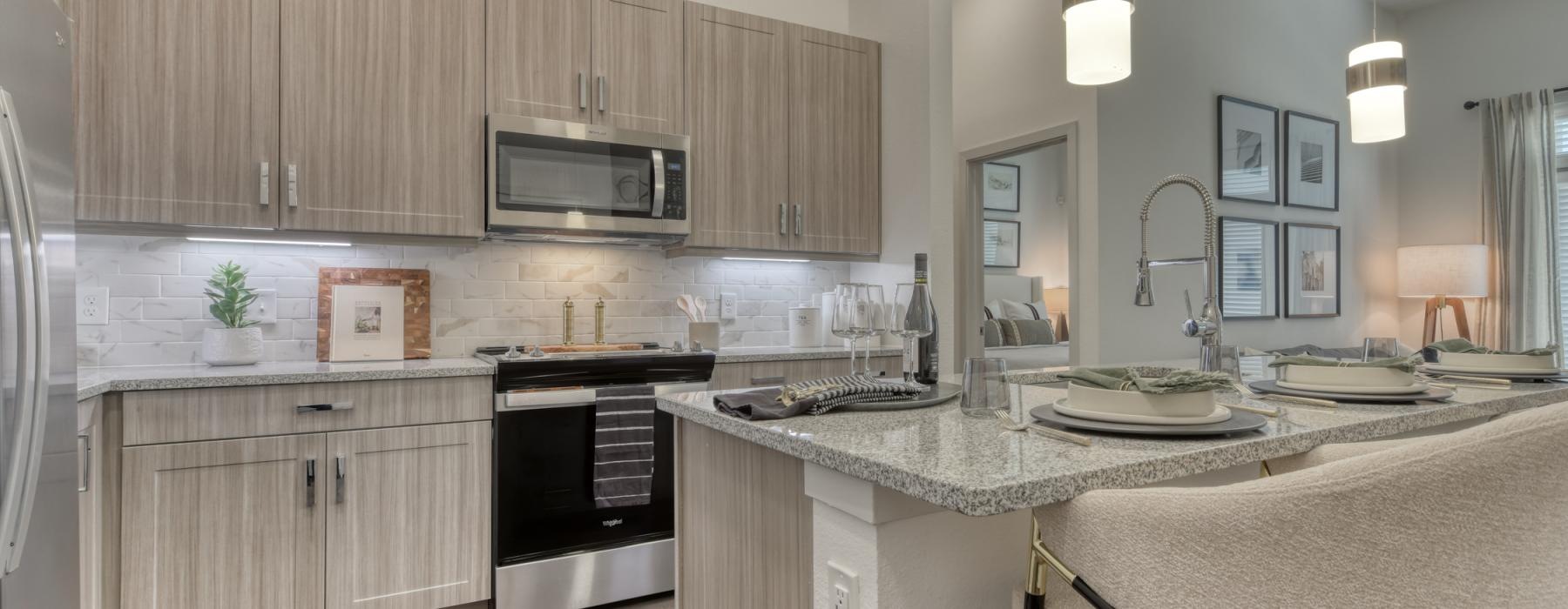 a kitchen with a marble counter top