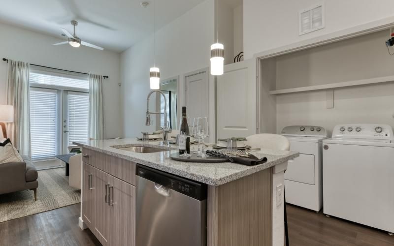 a kitchen with white appliances