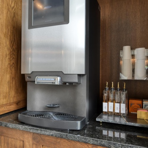 a kitchen with a stainless steel stove